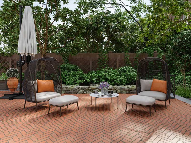 Outdoor patio seating with chairs and umbrella